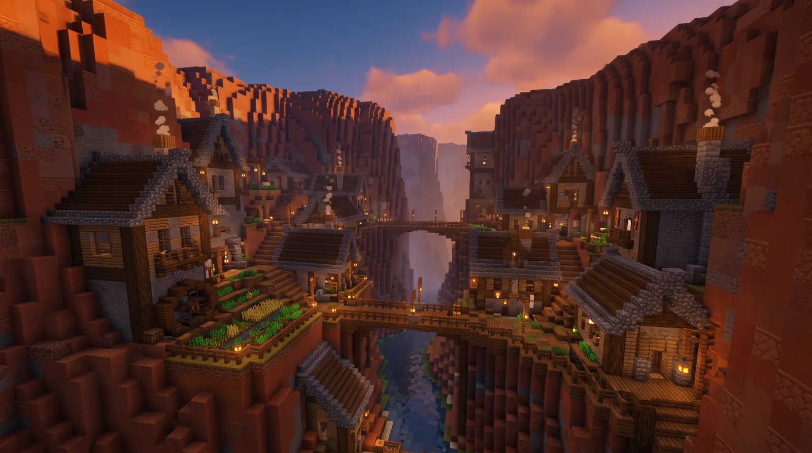 Complex medieval Minecraft village built into canyon walls during a sunset Complex medieval Minecraft village built into canyon walls during a sunset